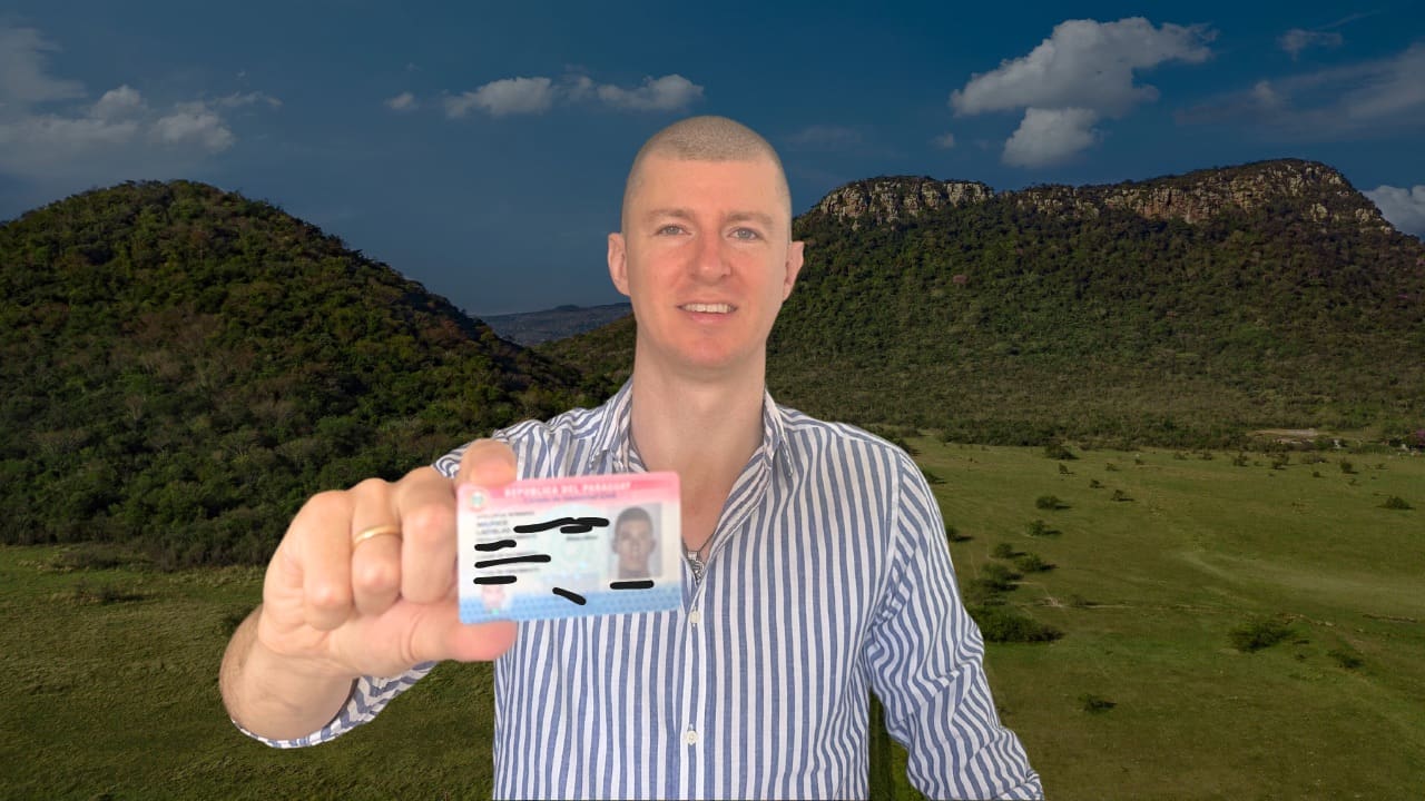 Copy of Residency in Paraguay - 1 Ladislas holding his Paraguay Residency Card